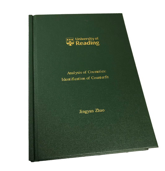 Green buckram covered thesis with gold crest and gold lettering